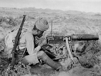 P18.1: Naik Shahamad Khan, 89th Punjabis, manning a Vickers-Maxim .303 machine gun, 1916 (NAM).