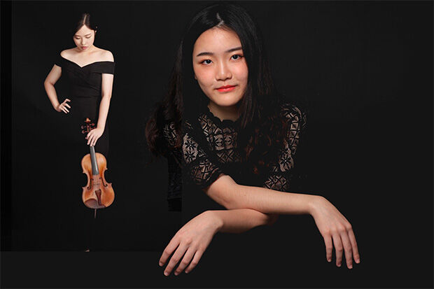 Pianist YunJou Lin in foreground with violinist Shuwei Zuo in background