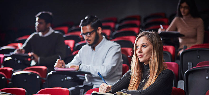 7 Event Management Reasons 880x400 - People in a lecture theatre 