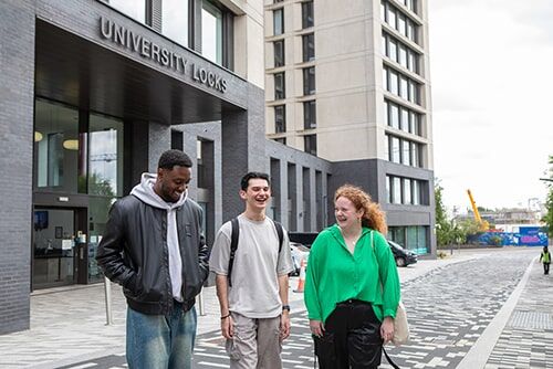 Students leaving the University Locks accommodation through the front entrance