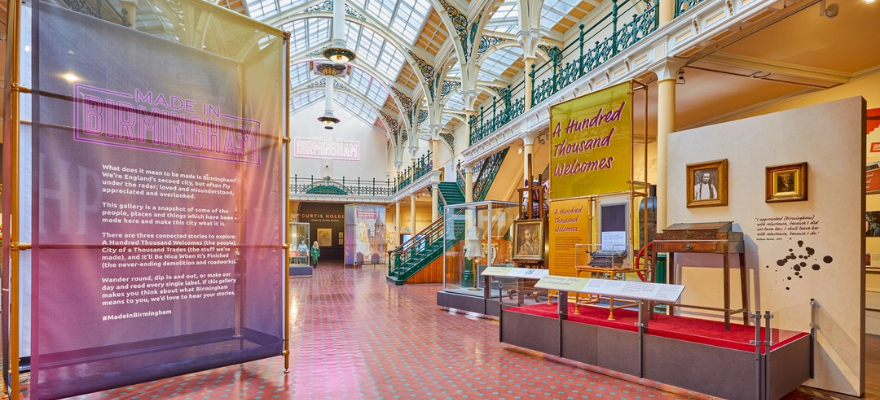 Gallery displays in an industrial Victorian looking building with a glass roof