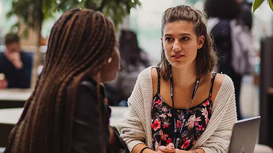 Two women in conversation