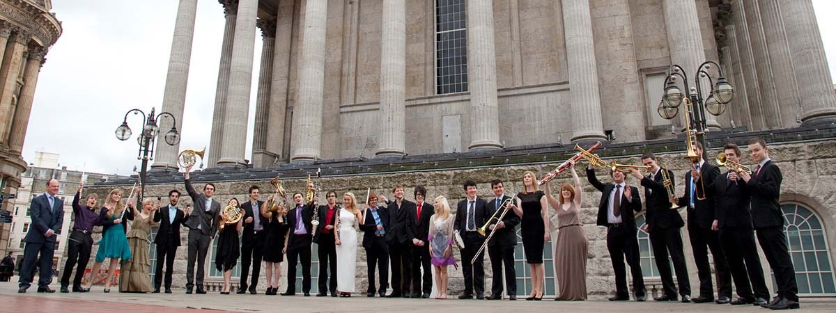 Music students group with instruments in Birmingham