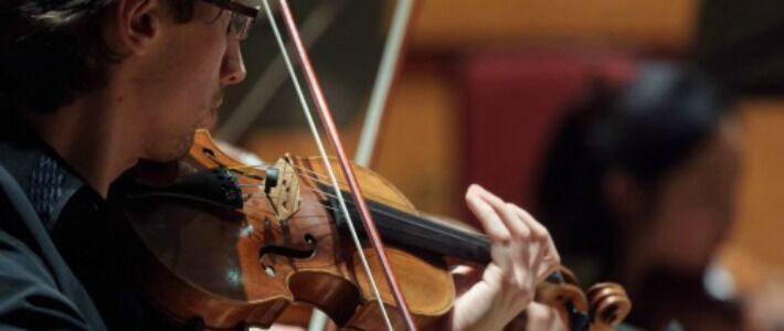 man playing violin