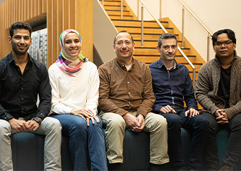 Diatomic project team group photo of five staff members