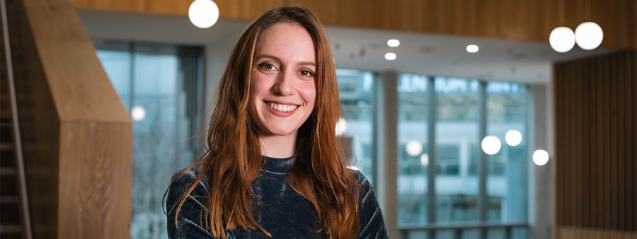 MA Acting student, Emma Graveling, stands posing for her I AM BCU photo in Royal Birmingham Conservatoire.