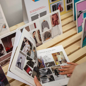 Fashion student with colour brochure
