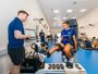 BCU Lecturer Craig Perrin with BCFC forward Ava Baker conducting testing on the isokinetic dynamometer which helps in testing muscle strength