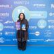 Professor Hanifa Shah holding her the Innovator Award at the Midlands Women in Tech Awards 2024.