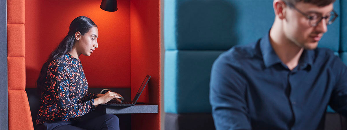 Finance and Investment MSc Course Image 1200x450 - Woman sat at a desk with a laptop