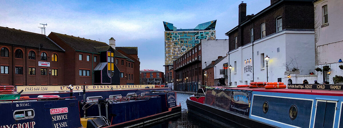 Canal boats in Gas Street Basin with the Mailbox building in the background