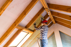 Photo of builder installation roof insulation