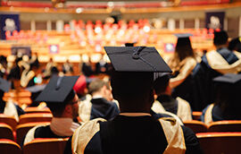 Graduation hall looking from behind a graduate