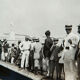 Jamaican migrants queuing shoreside