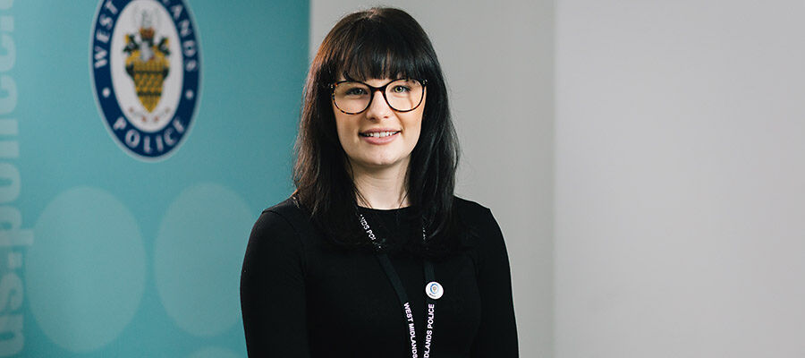 Jemma Stanford 900x600 - Jemma stood in front of the West Midlands Police logo