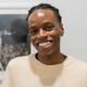 Jonathan stood with one his photographs in the exhibition. Credit: Jonathan Williams