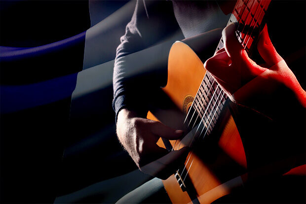 Classical guitarist overlayed with French flag