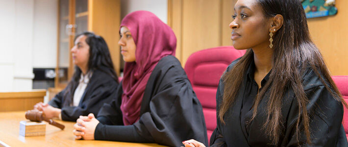 Group of law students in lock court room
