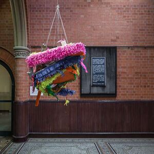 Margaret Street Atrium with large piñata type sculpture hanging from ceiling