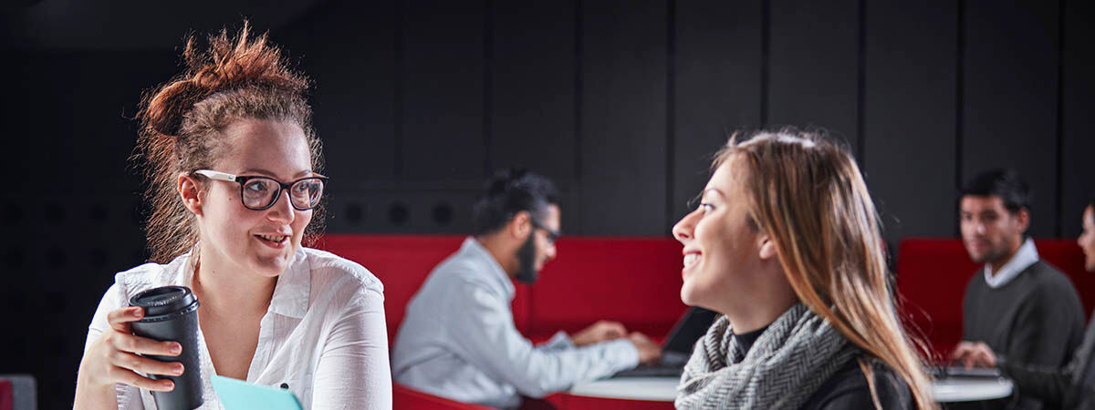 Marketing (Advertising and PR) Course Image 1200x450 - Two women at a table