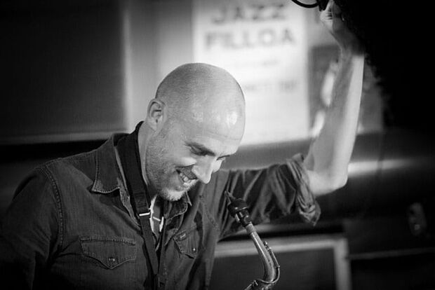 Black and white portrait of saxophonist Mike Fletcher