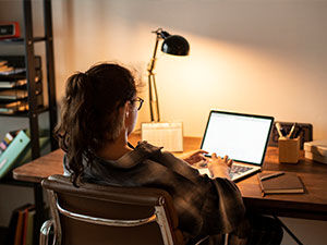 Student at home on laptop