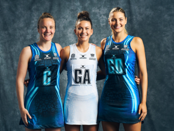 Birmingham Panter players: Gabby Marshall, Gabby Sinclair, Gabby Coffey, wearing the new netball dress kit. Two are in blue and the other is in white