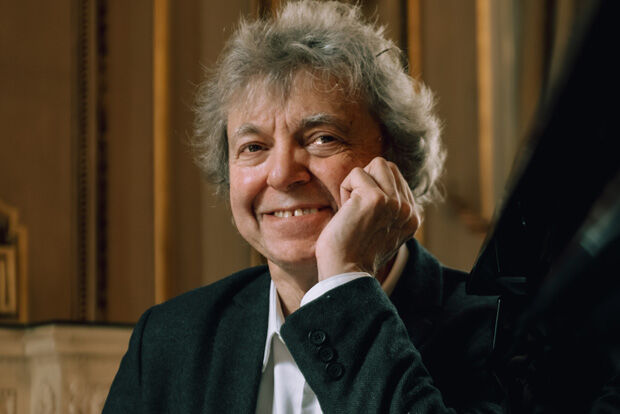 Close up portrait of pianist Pascal Rogé