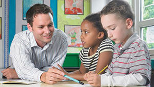 Teacher with young pupils