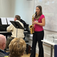 First-year BMus saxophonist Kara Woods playing in lecture room