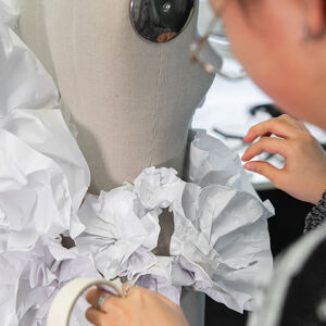 Student working with mannequin