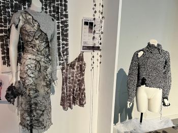 A dress, top and jumper are on mannequins,  made from old clothes