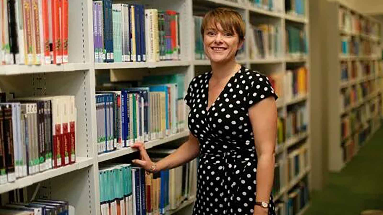 A staff member in a library