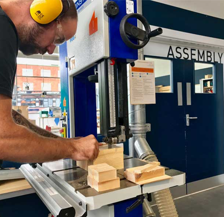 Man using woodworking machinery