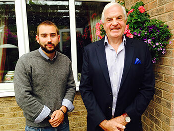 Stephen Walters and Jonathan Jackson - Stephen and Jonathan stood outside a house