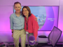 Dr Steve McCabe and BBC Radio WM's Sarah Julian standing in a radio studio with a purple background
