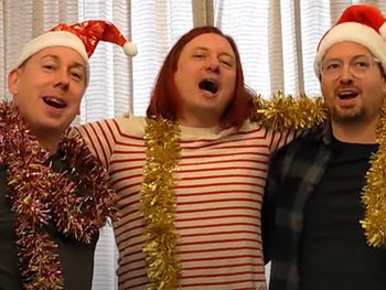 Peter Green with brothers John and Chris singing along to single 'Tinsel Round The Telly' for their homemade music video. 